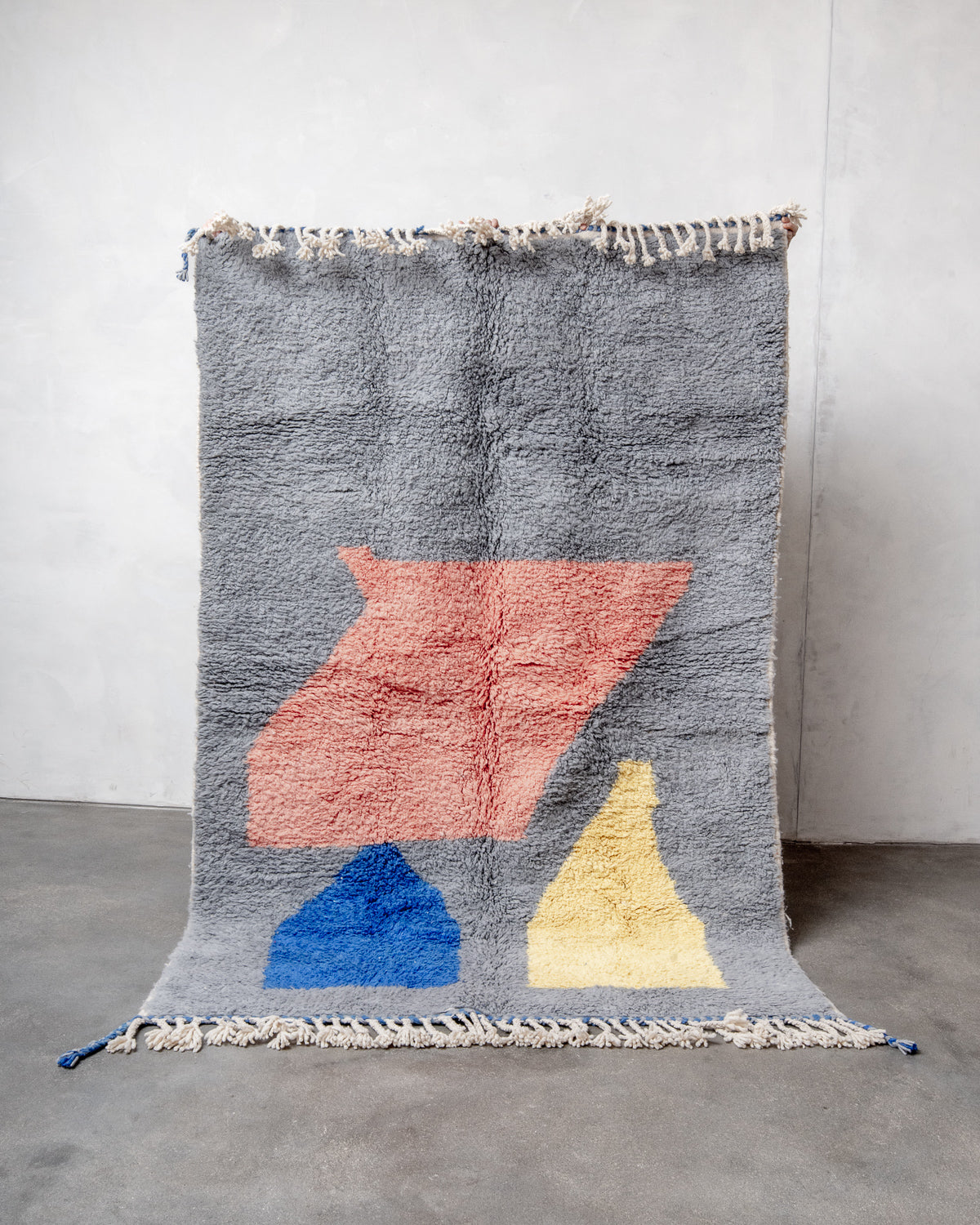Modern, designer, handcrafted Berber rug from Morocco. Beniourain carpet with beautiful colours and patterns and fluffy wool texture.
